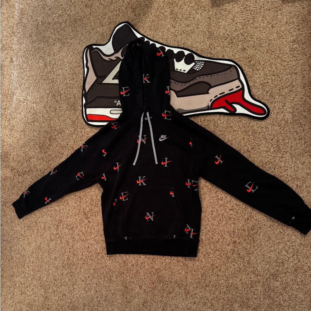 Nike Black Hoodie with Red and White Logo Pattern